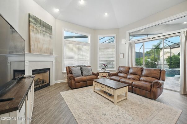 Fireplace, Interior, Living room, Recessed Lighting, Sun Room, Wood Texture Flooring
