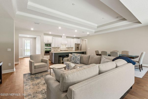 Dining room, Interior, Kitchen, Living room, Recessed Lighting, Stainless Steel Appliances, Wood Texture Flooring