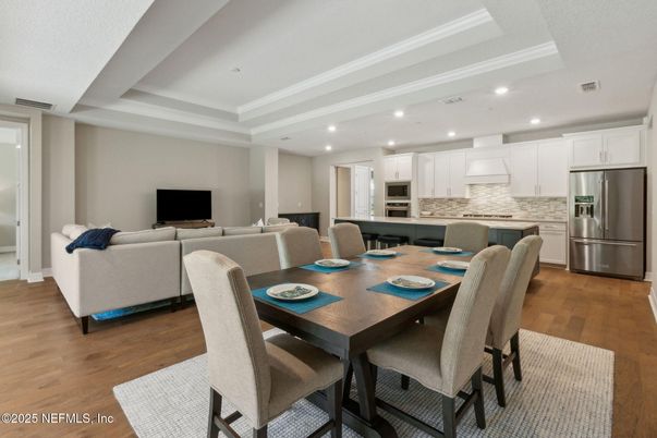 Dining room, Interior, Kitchen, Living room, Recessed Lighting, Stainless Steel Appliances, Wood Texture Flooring
