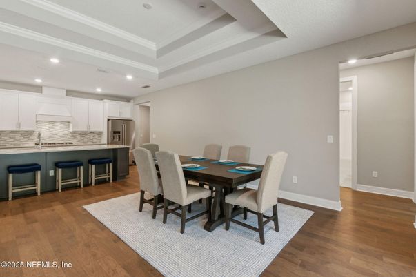 Dining room, Interior, Kitchen, Recessed Lighting, Stainless Steel Appliances, Wood Texture Flooring