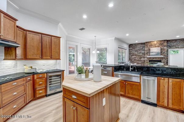 Dining room, Interior, Kitchen, Pendant Lights, Recessed Lighting, Stainless Steel Appliances, Stone Walls, Wood Texture Flooring