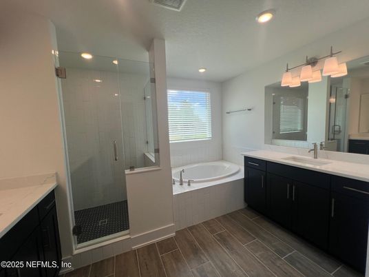 Bathroom, Dual Sink Vanities, Glass Shower, Interior, Recessed Lighting, Wood Texture Flooring