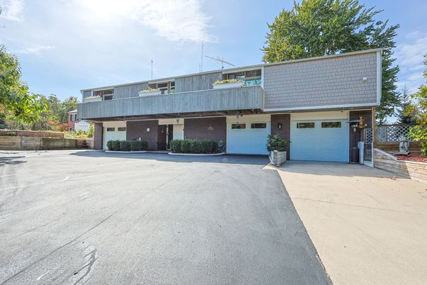 Attached, Exterior, Facade, Brick Facade, Raised Ranch