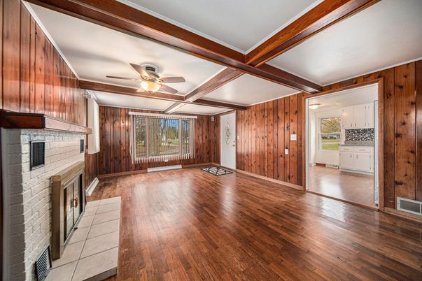 Empty room, Fireplace, Interior, Stone Walls, Wooden Beams, Wood Texture Flooring, Wooden Walls