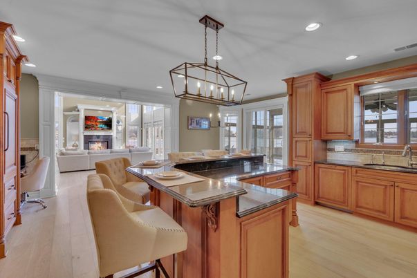Chandelier, Dining room, Fireplace, Interior, Kitchen, Living room, Pendant Lights, Recessed Lighting, Wood Texture Flooring
