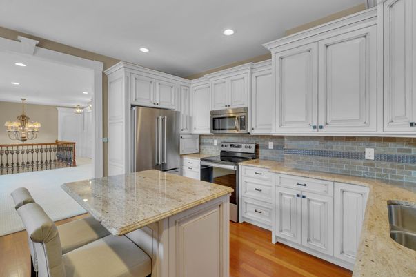 Chandelier, Interior, Kitchen, Pendant Lights, Recessed Lighting, Stainless Steel Appliances, Wood Texture Flooring