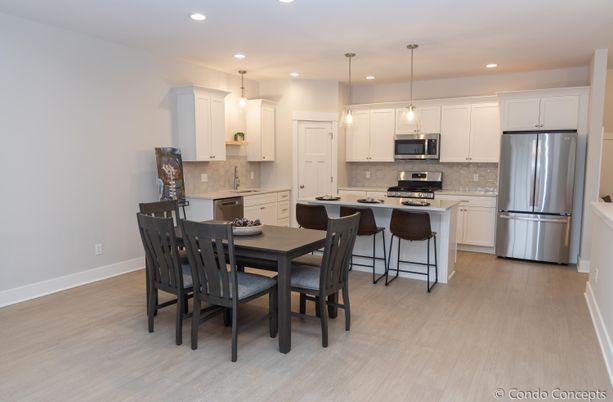 Dining room, Interior, Kitchen, Pendant Lights, Recessed Lighting, Stainless Steel Appliances, Wood Texture Flooring