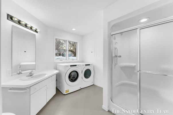 Bathroom, Dual Sink Vanities, Glass Shower, Interior, Recessed Lighting, Washer