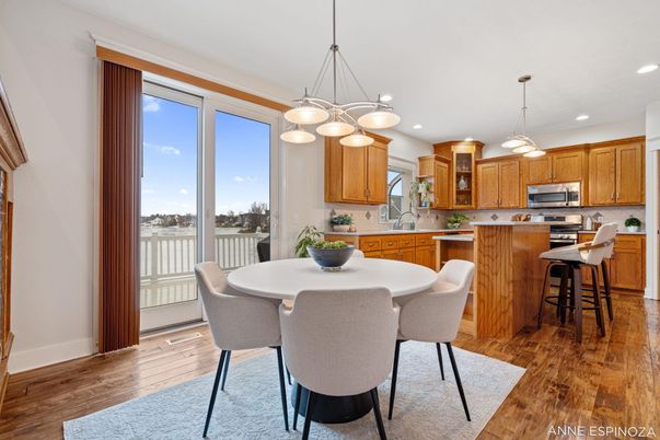 Dining room, Interior, Kitchen, Pendant Lights, Recessed Lighting, Stainless Steel Appliances, Wood Texture Flooring