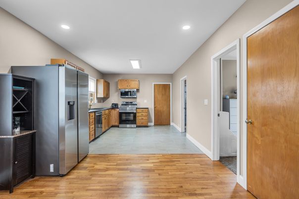 Interior, Kitchen, Recessed Lighting, Stainless Steel Appliances, Wood Texture Flooring