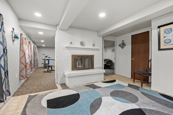Fireplace, Fitness Equipment, Interior, Recessed Lighting, Stone Walls