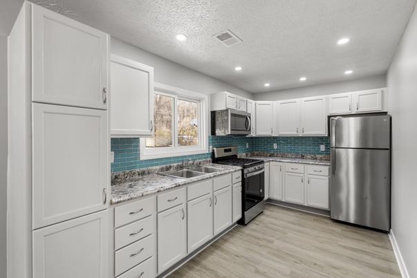 Interior, Kitchen, Recessed Lighting, Stainless Steel Appliances, Wood Texture Flooring