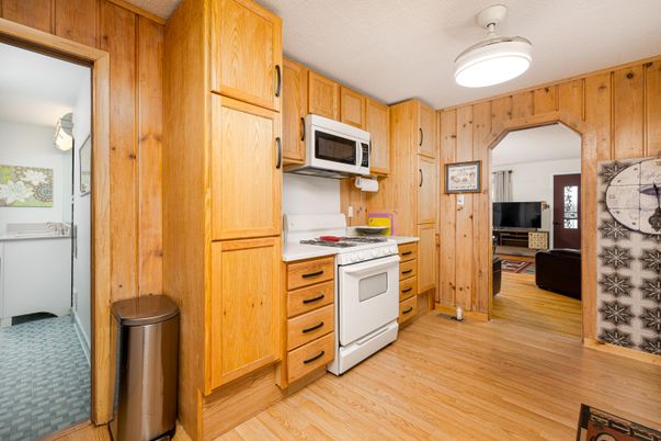 Interior, Kitchen, Washer, Wood Texture Flooring, Wooden Walls