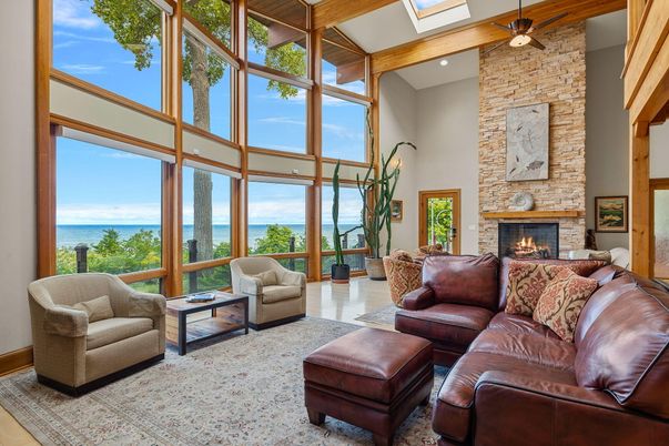 Fireplace, Interior, Living room, Recessed Lighting, Stone Walls, Sun Room, Water, Wooden Beams