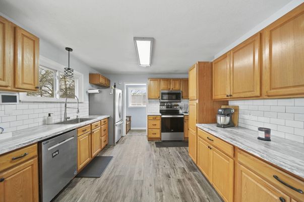 Interior, Kitchen, Pendant Lights, Stainless Steel Appliances, Wood Texture Flooring