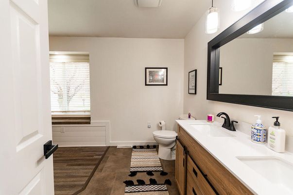 Bathroom, Dual Sink Vanities, Interior, Pendant Lights, Wood Texture Flooring