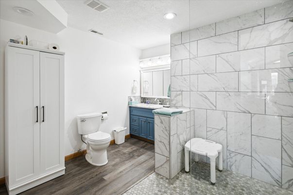 Bathroom, Interior, Marble Walls, Recessed Lighting, Wood Texture Flooring