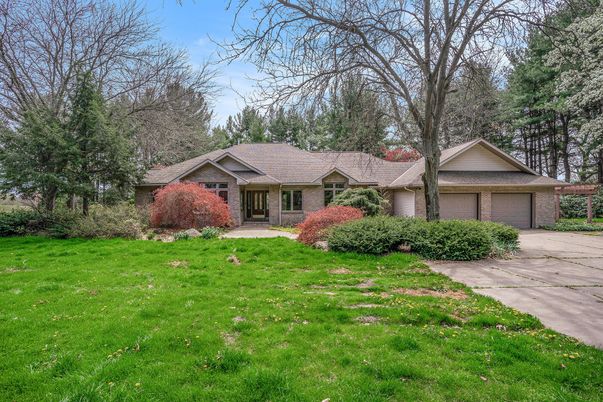 Attached, Backyard, Exterior, Facade, Brick Facade, Ranch