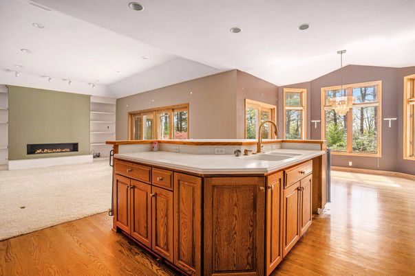 Chandelier, Fireplace, Interior, Kitchen, Pendant Lights, Recessed Lighting, Wood Texture Flooring