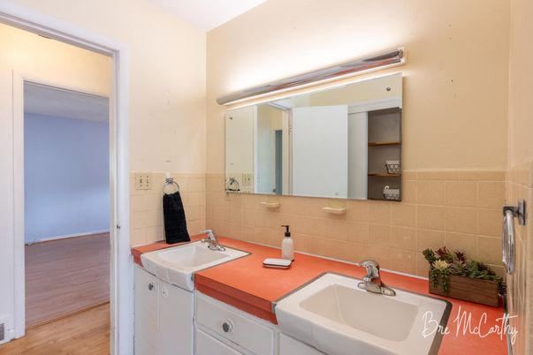 Bathroom, Dual Sink Vanities, Interior, Tile Countertops, Wood Texture Flooring