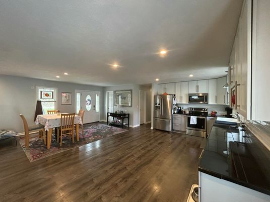 Dining room, Interior, Kitchen, Recessed Lighting, Stainless Steel Appliances, Wood Texture Flooring