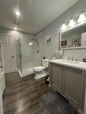 Bathroom, Glass Shower, Interior, Recessed Lighting, Wood Texture Flooring