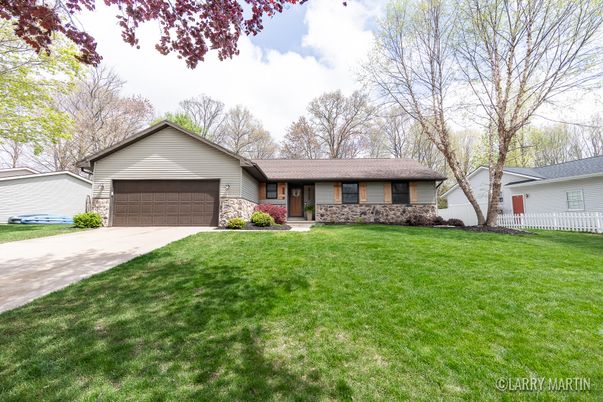 Attached, Backyard, Exterior, Facade, Brick Facade, Ranch