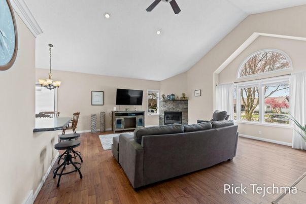 Chandelier, Dining room, Fireplace, Interior, Living room, Recessed Lighting, Wood Texture Flooring
