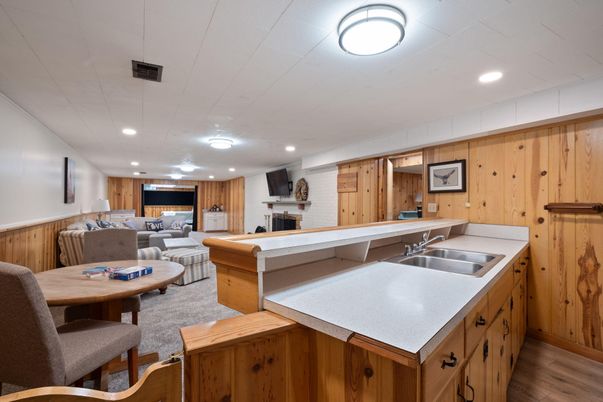 Billiard Table, Fireplace, Game Room, Interior, Kitchen, Living room, Recessed Lighting, Wood Texture Flooring, Wooden Walls
