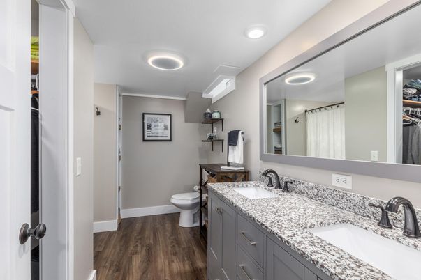 Bathroom, Dual Sink Vanities, Interior, Recessed Lighting, Wood Texture Flooring