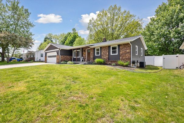 Attached, Backyard, Exterior, Facade, Brick Facade, Cape Cod