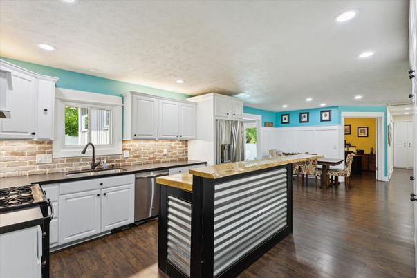 Dining room, Interior, Kitchen, Recessed Lighting, Stainless Steel Appliances, Wood Texture Flooring