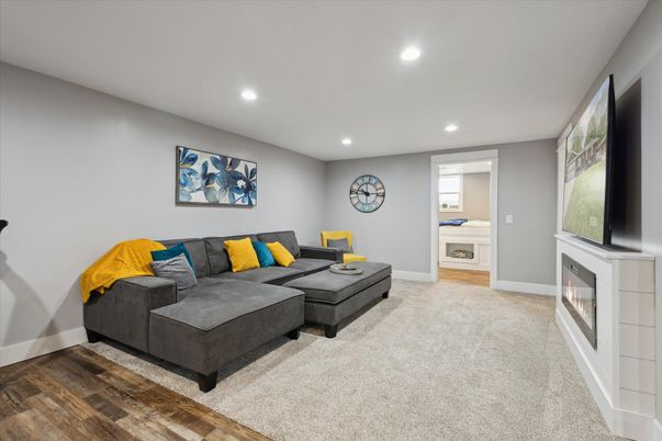 Fireplace, Interior, Living room, Recessed Lighting, Wood Texture Flooring