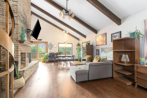 Dining room, Fireplace, Interior, Living room, Pendant Lights, Stone Walls, Wooden Beams, Wood Texture Flooring