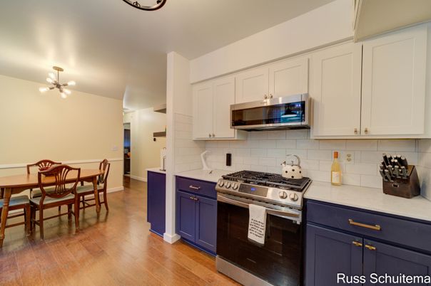Dining room, Interior, Kitchen, Pendant Lights, Stainless Steel Appliances, Wood Texture Flooring