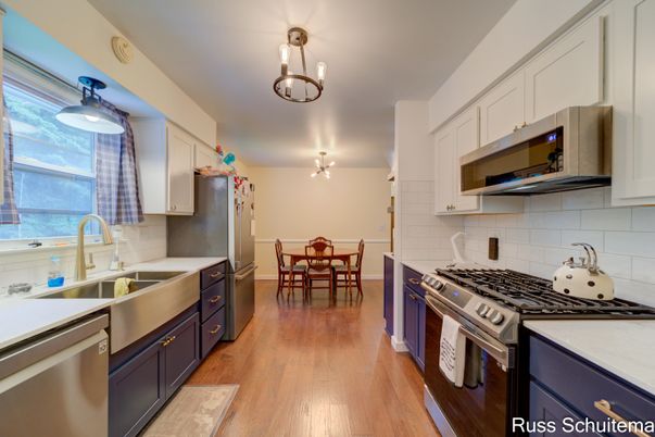Dining room, Interior, Kitchen, Pendant Lights, Stainless Steel Appliances, Wood Texture Flooring