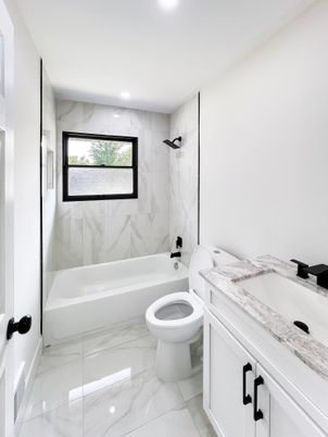 Bathroom, Dual Sink Vanities, Interior, Marble, Marble Walls, Recessed Lighting