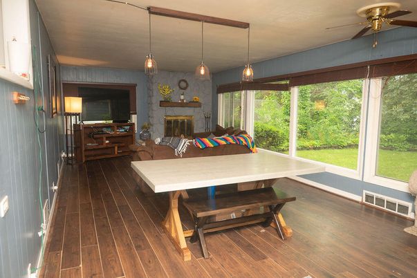 Dining room, Fireplace, Interior, Pendant Lights, Wood Texture Flooring