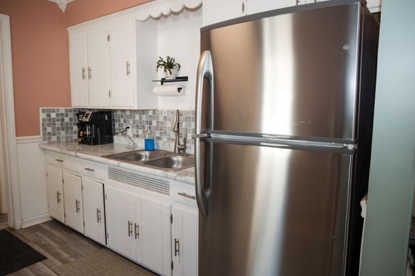 Interior, Kitchen, Stainless Steel Appliances, Tile Countertops, Wood Texture Flooring