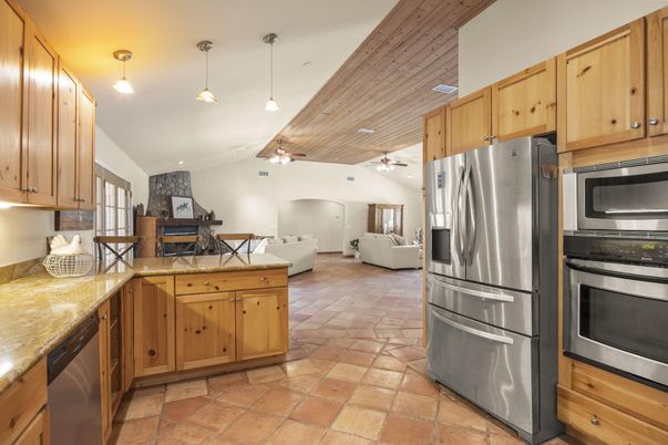 Fireplace, Interior, Kitchen, Living room, Pendant Lights, Stainless Steel Appliances, Wooden Ceilings