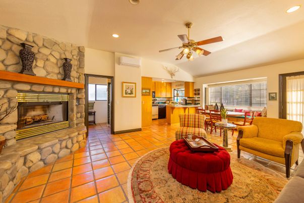 Dining room, Fireplace, Interior, Kitchen, Living room, Recessed Lighting, Stone Walls