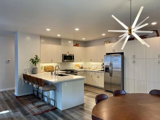 Interior, Kitchen, Pendant Lights, Recessed Lighting, Stainless Steel Appliances, Wood Texture Flooring