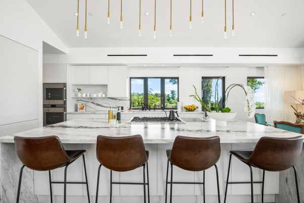 Interior, Kitchen, Marble Walls, Pendant Lights, Recessed Lighting, Stainless Steel Appliances