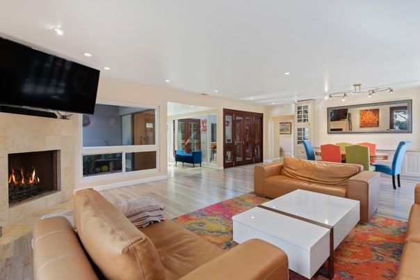 Dining room, Fireplace, Interior, Living room, Recessed Lighting, Wood Texture Flooring