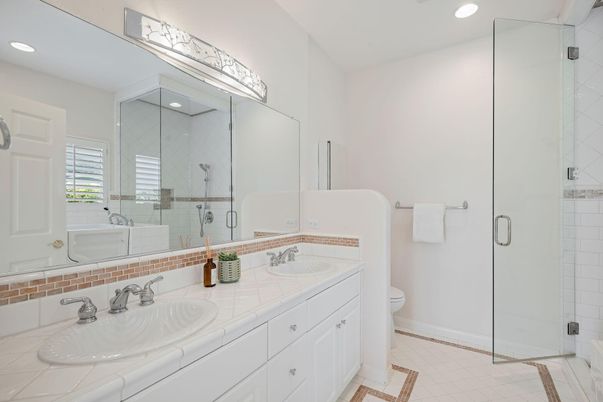 Bathroom, Dual Sink Vanities, Glass Shower, Interior, Recessed Lighting, Tile Countertops