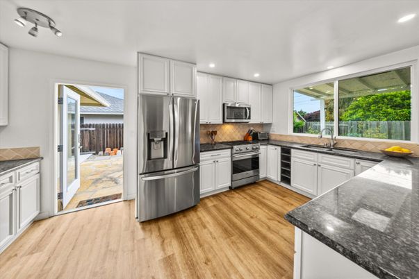 Interior, Kitchen, Recessed Lighting, Stainless Steel Appliances, Wood Texture Flooring