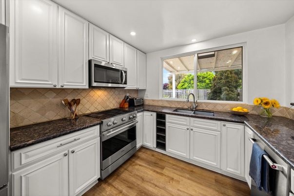Interior, Kitchen, Recessed Lighting, Stainless Steel Appliances, Wood Texture Flooring