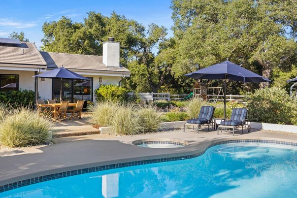 Exterior, Pool, Solar Panels