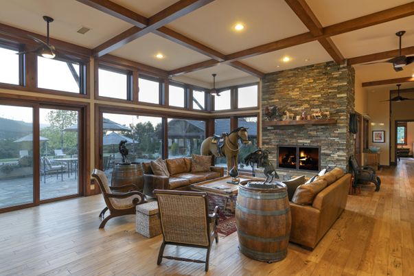 Fireplace, Interior, Living room, Pendant Lights, Recessed Lighting, Stone Walls, Wooden Beams, Wood Texture Flooring