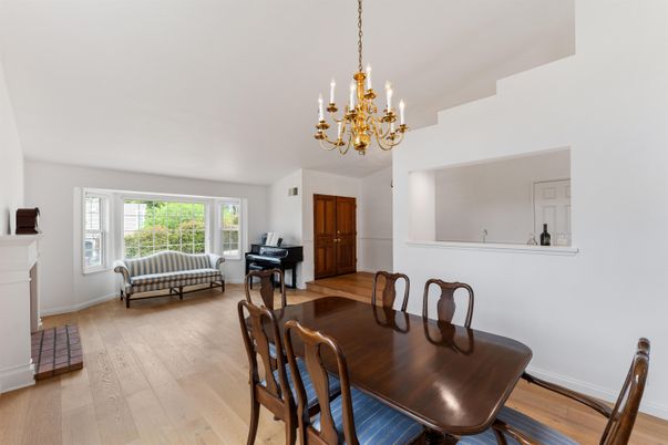 Chandelier, Dining room, Fireplace, Interior, Piano, Wood Texture Flooring